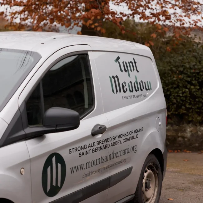 Tynt Meadow delivery van parked up outside Mount St Bernard Abbey